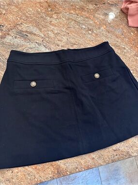 Black Mini Skirt with Gold Button Pocket Details